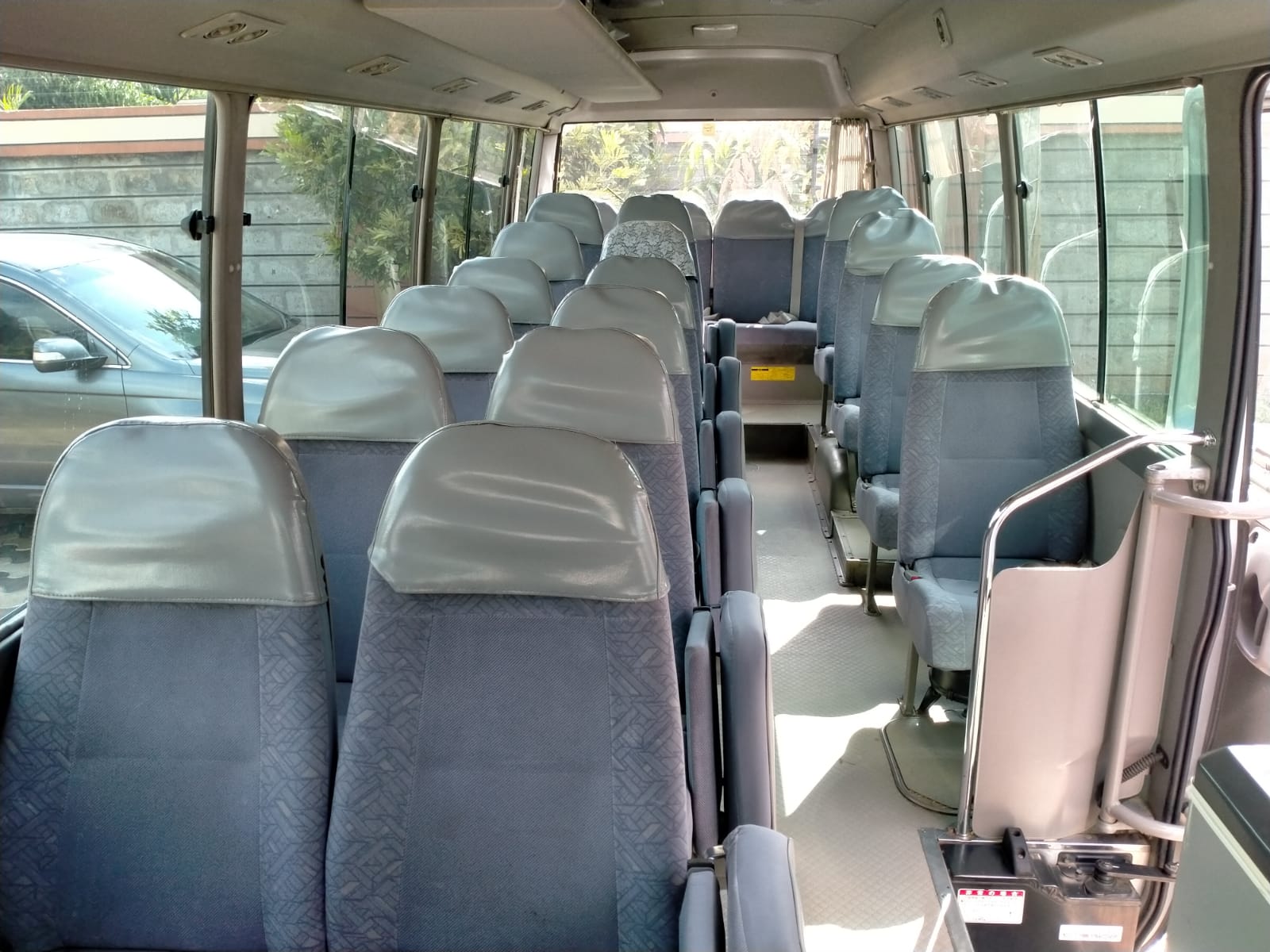 Coaster Interior with Blue Trim | 26-Seater Bus Nairobi